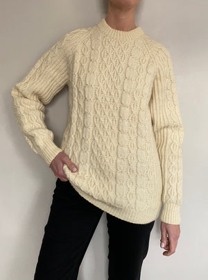 Handknitted Aran jumper in cream wool